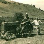 Doing war work on the Mendips; Irwin Woodhead sitting on the tractor, with brother-in-law Stuart Armfield looking on.