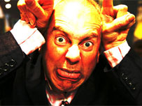 Gyles Brandreth pulling a scary face