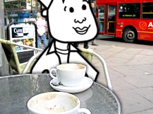 Tim sitting outside a cafe