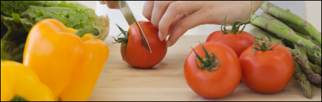 A chef chopping up vegetables