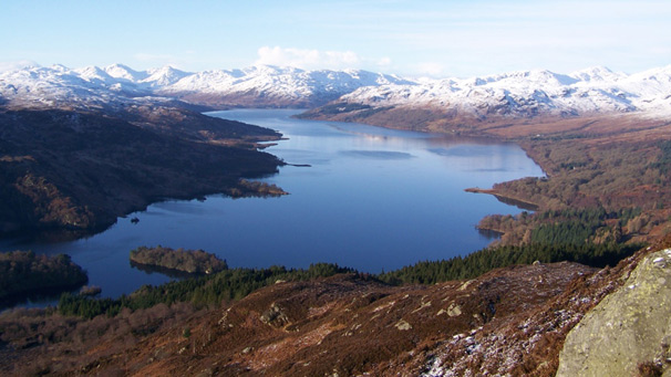 Loch Katrine with snowy peaks beyond