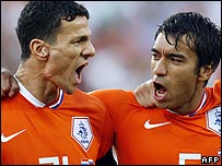Dutch defender Khalid Boulahrouz and midfielder Giovanni van Bronckhorst sing their national anthem prior to the kick off of the Euro 2008 quarter-final 