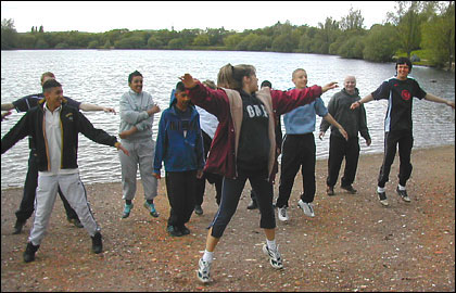 Janine encourages everyone to warm-up first