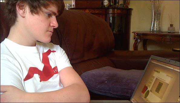 Teenager using computer