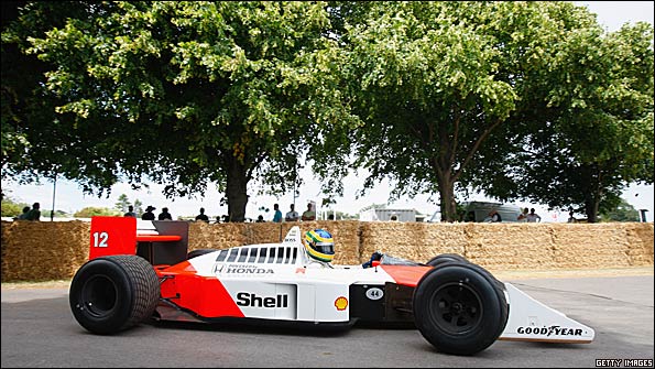 Bruno Senna drives his uncle Ayrton's 1988 McLaren up the hill at Goodwood