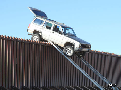 A vehicle stuck on top of the US-Mexico border