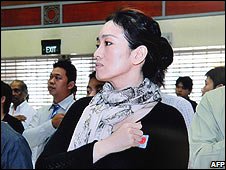 Củng Lợi tại lễ trao hộ chiếu Singapore (ngày 8 tháng 11 năm 2008)