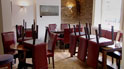 Restaurant with chairs on tables