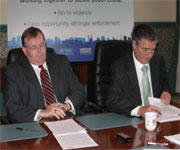 Cllrs. Mike Fisher & Steve O'Connell at a desk