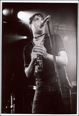 Kaiser Chiefs: Ricky Wilson playing tambourine