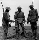 Photo of Irish soldiers examining a captured German machine gun