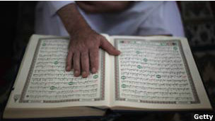 A boy reading the Koran