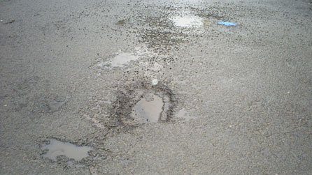 Pothole, photo by Justin Cooper