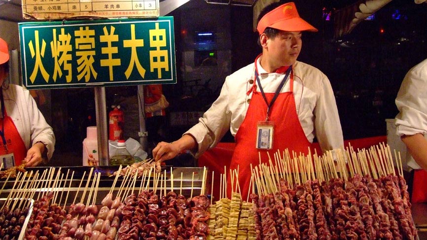 Street vendors in a Beijing street market.