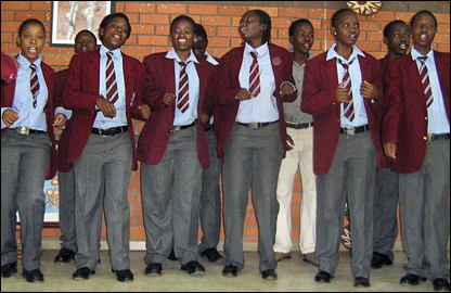 Young adults of the Shashe River School choir sing at the annual general meeting.