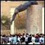 estátua de Saddam Hussein derrubada