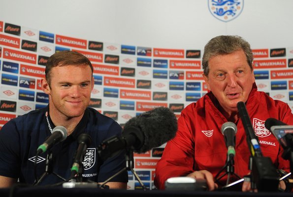 Wayne Rooney(left) and England boss Roy Hodgson