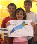 Georgia is all smiles with her brothers