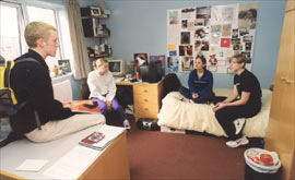 Students in bedroom.