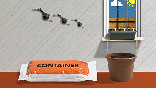 A compost bag showing the word 'container' on it.