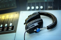 Headphones on a desk in the studio