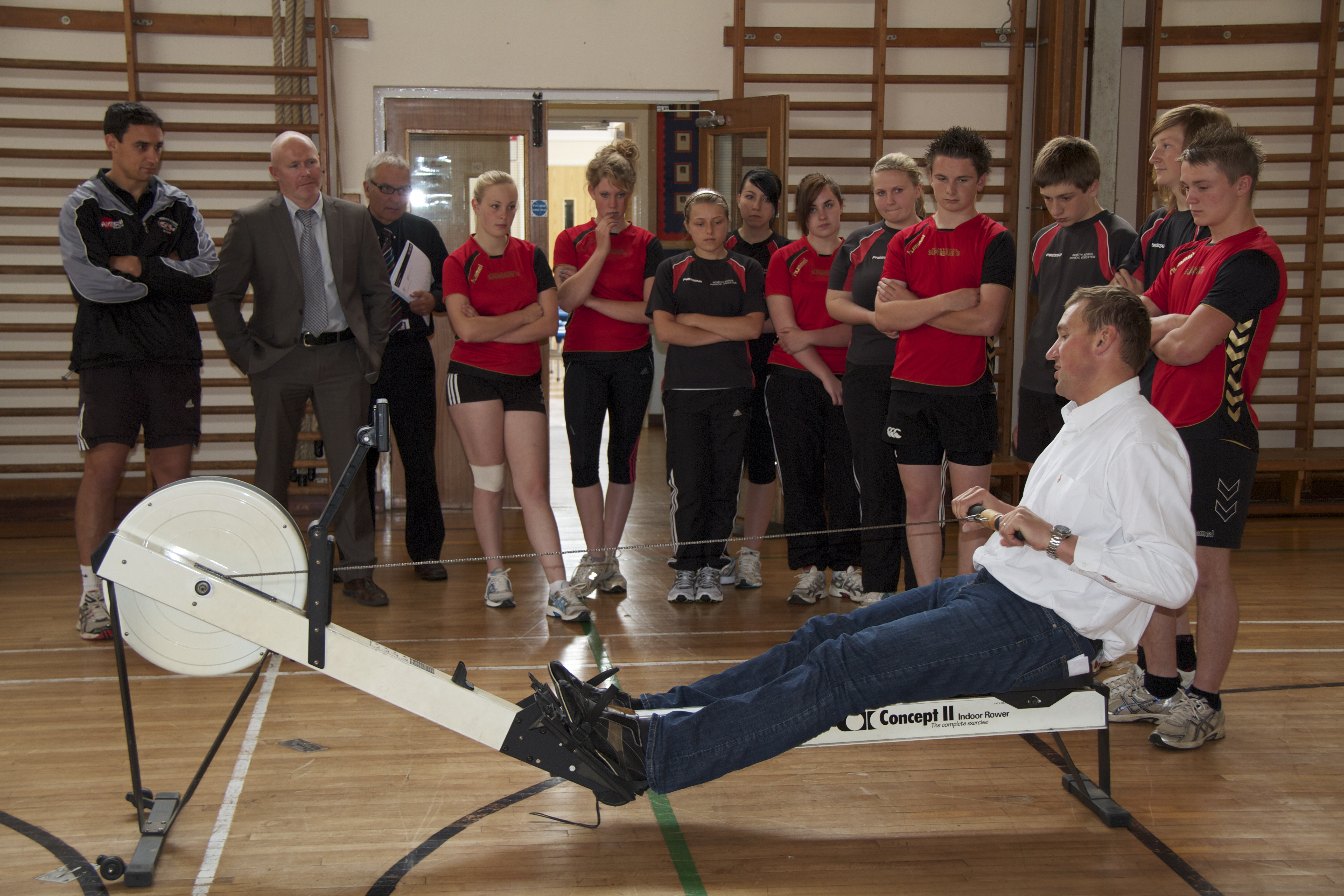 Matthew Pinsent challenges students on the rowing machine