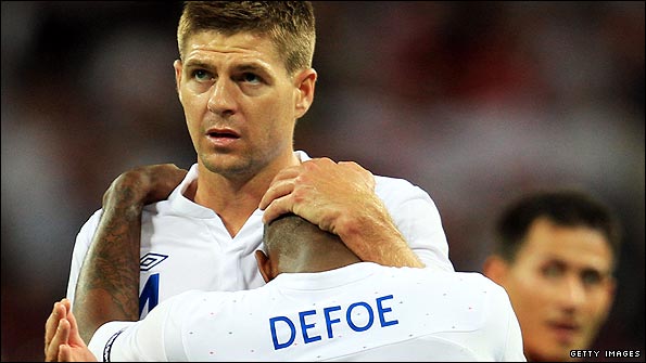 Gerrard gives Defoe a pat on the head for his hat-trick