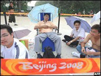 People waiting to get tickets for the Olympics