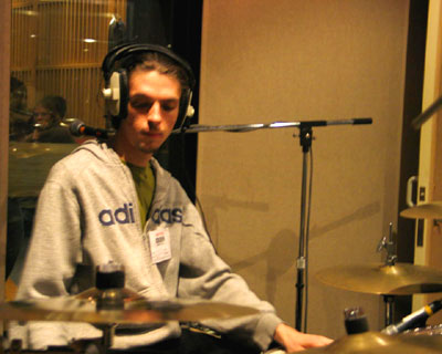 Tom Skinner on drums