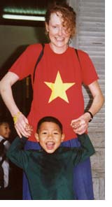 Jacci Garside with Kianh, one of the orphans who inspired her set up a foundation to help the orphanage