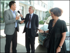 Paul Lin of BYD Autos in Shenzhen, with BBC Business Correspondent Peter Day and producer Julie Ball