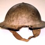 The bullet-damaged helmet