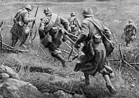 Image of soldiers running across the battlefields of the Somme