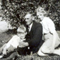 Sitting on the shore - Joan, her grandfather James and brother Howard
