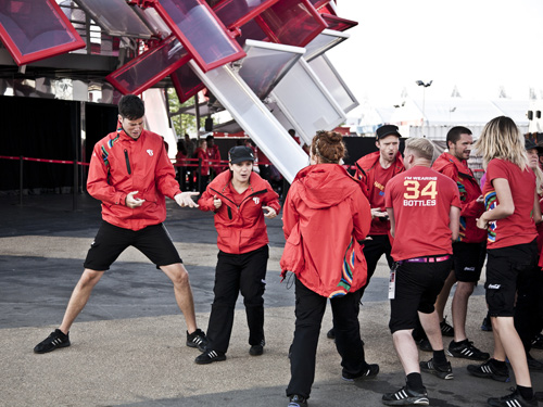 Coca Cola employees in group dance