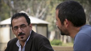 Feras Killani (L) and Goktay Koraltan at a hotel in Tripoli, Libya, on 9 March 2011