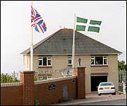 A Devon Flag alongside a Union Flag at Northam