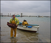 Oystermen and boat at mersea