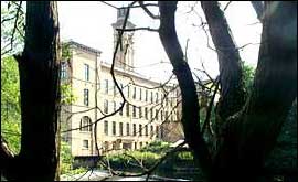 the mill seen from across the river