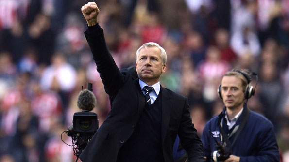 Alan Pardew salutes the Newcastle fans at the final whistle.