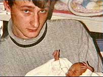 Chris Miller with baby