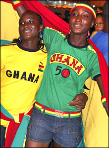 Two Ghanaian youngsters celebrate in the country's colours