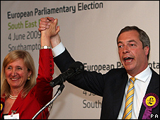 Leader of the UK Independence Party (UKIP) Nigel Farage and Marta Andreasen celebrate both being elected as UKIP MEPs