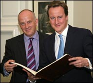 John Mowbray and David Cameron with a Book of Life