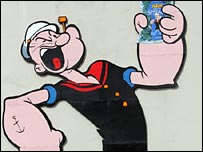 marinheiro Popeye come espinafre para ficar forte