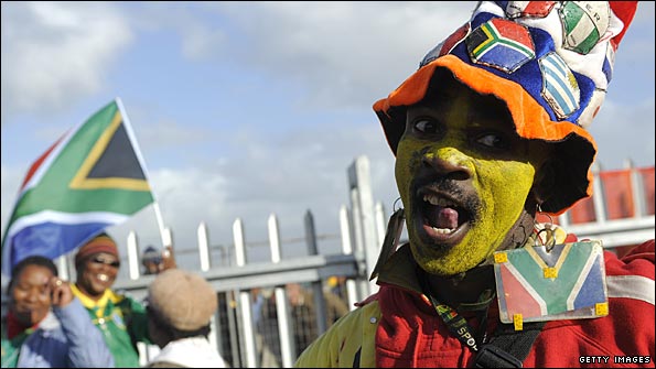A South Africa fan warms up for the World Cup