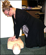 Natalie practices cpr