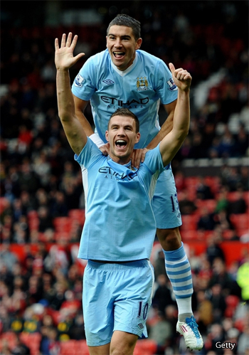 Edin Dzeko of Manchester City celebrates scoring his team