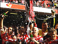 Doncaster Rovers players celebrate the win