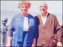 Joan's birth parents. 